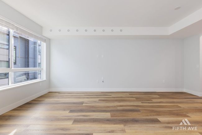 Spare room with wood finished floors | Image 4