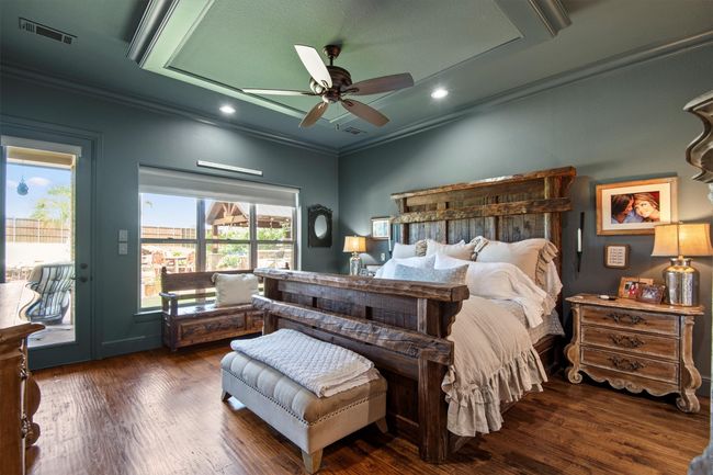 Bedroom with access to exterior, ornamental molding, recessed lighting, dark wood-type flooring, and a ceiling fan | Image 16