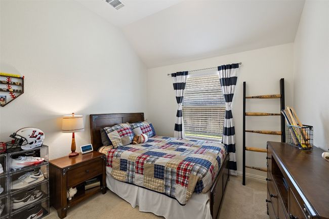 Bright and spacious secondary bedroom with flexible layout. | Image 25