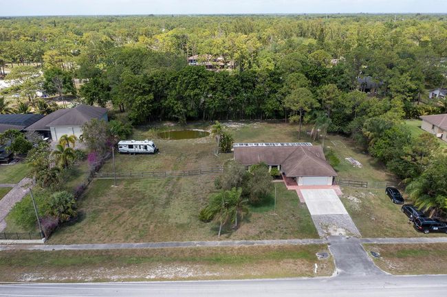 15429 Temple Blvd, House other with 3 bedrooms, 2 bathrooms and null parking in Loxahatchee FL | Image 70