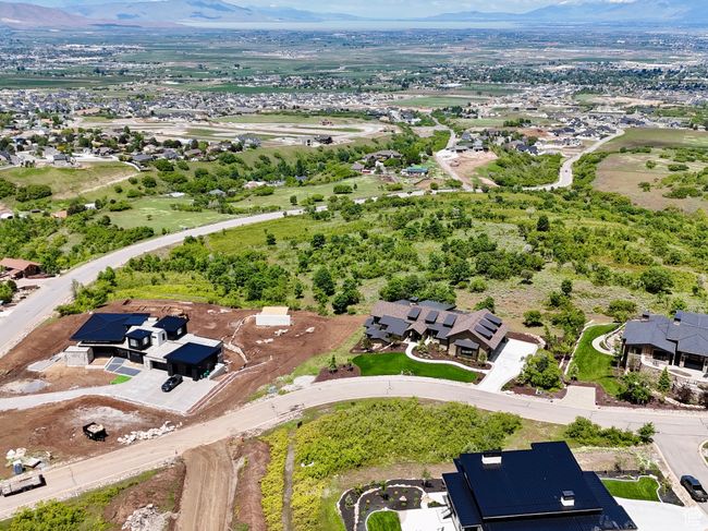Aerial view of property and surrounding area with a mountain backdrop and nearby suburban area | Image 10