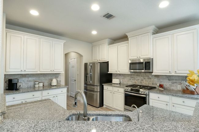 Plenty of storage in this open kitchen! | Image 7