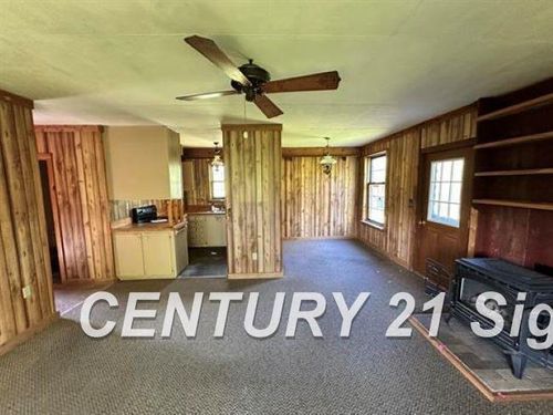 605 N Poor Farm Rd, Harrisville, MI, 48740-9666 | Card Image