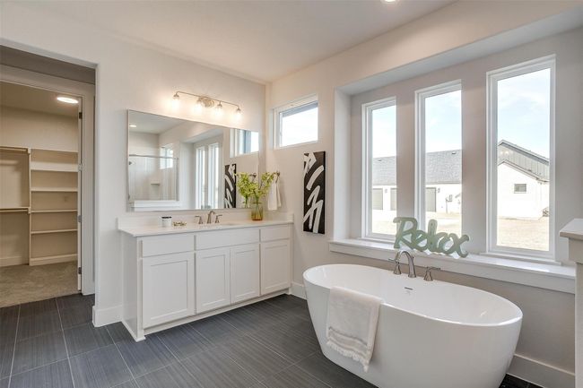 Bathroom featuring vanity, tile patterned flooring, and independent shower and bath | Image 24