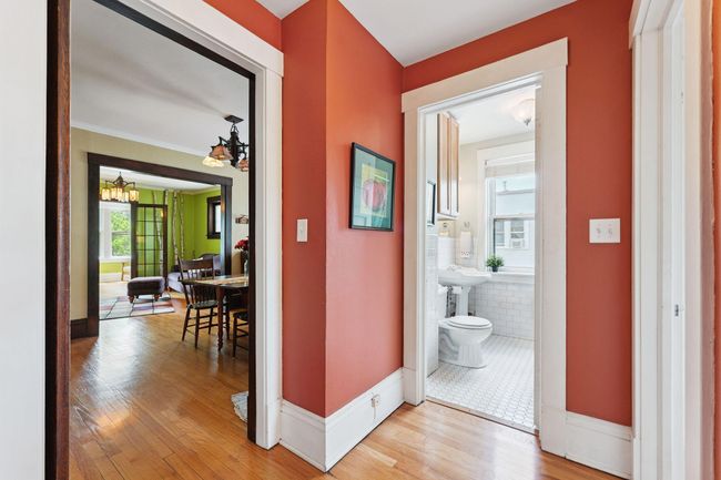 View into the bathroom on the right and the dining room on the left | Image 24