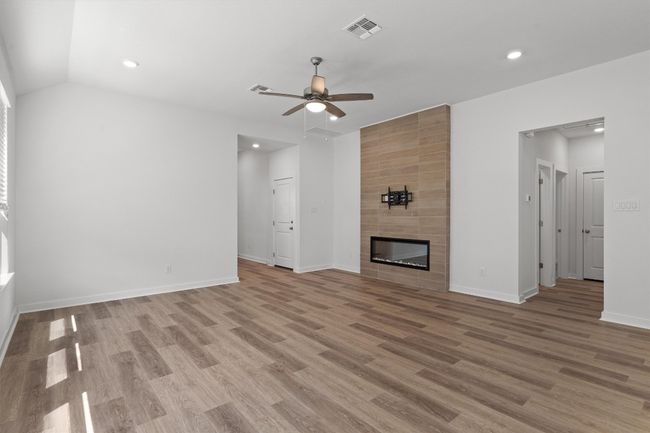 Living room with fireplace | Image 6