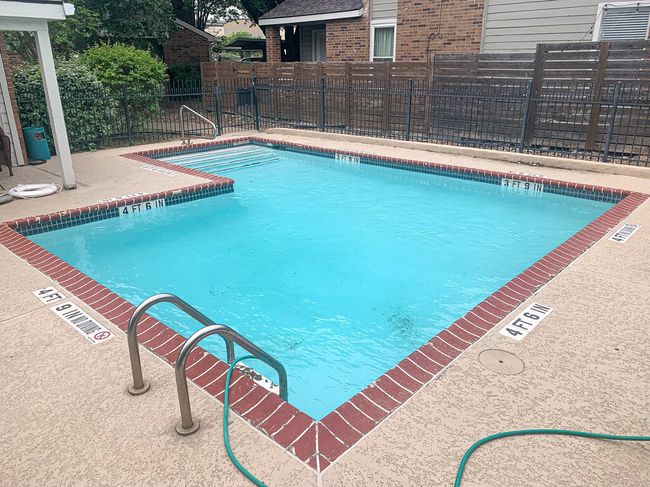 Community pool with fence | Image 19