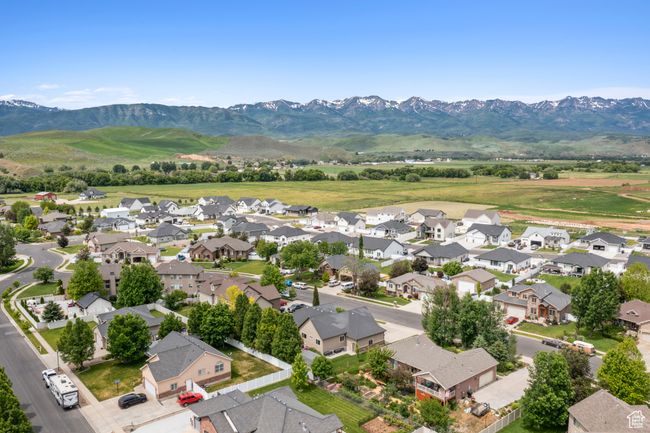 Aerial perspective of suburban area with a mountainous background | Image 43