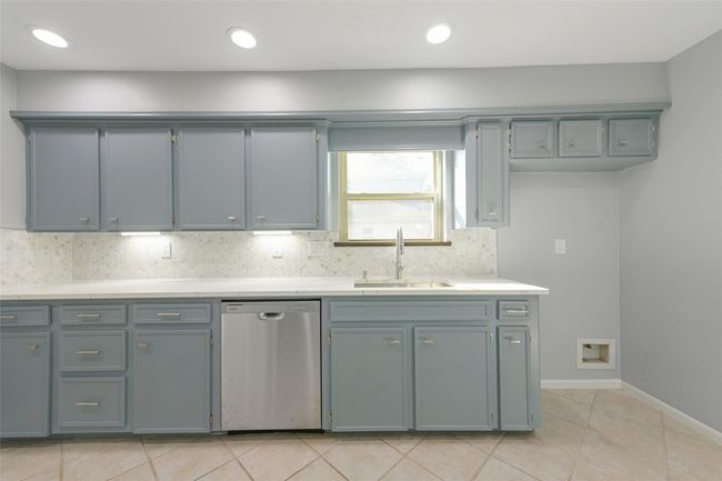 Plenty of cabinets & counter space. Kitchen window with new sink & faucet | Image 9