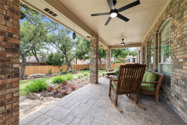 Spacious covered patio with new modern ceiling fans. | Image 29