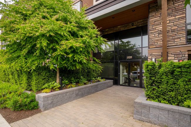 Entrance to property featuring stone siding | Image 5