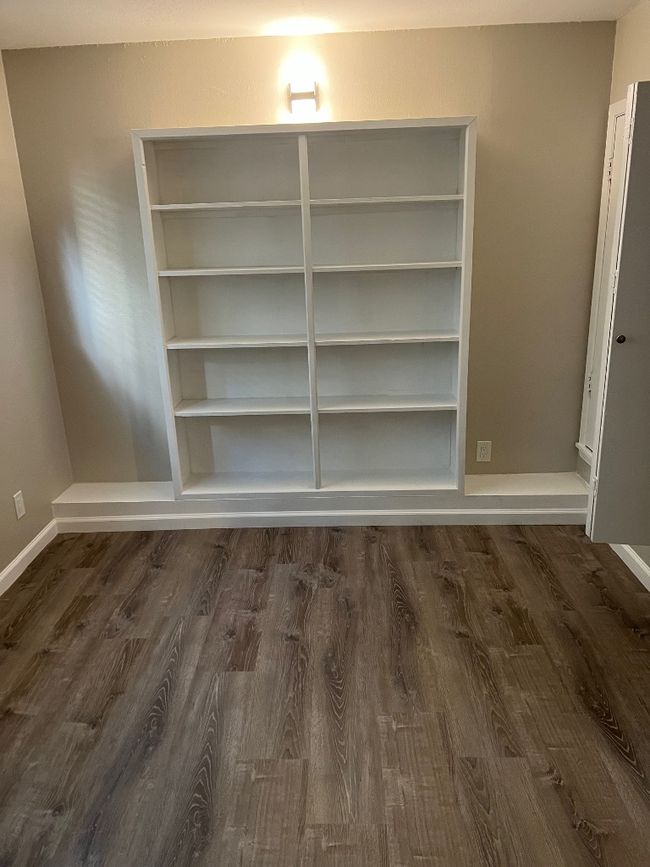 Details featuring wood finished floors and baseboards | Image 22
