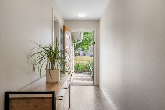Welcoming and spacious entry with recent front door. | Image 9