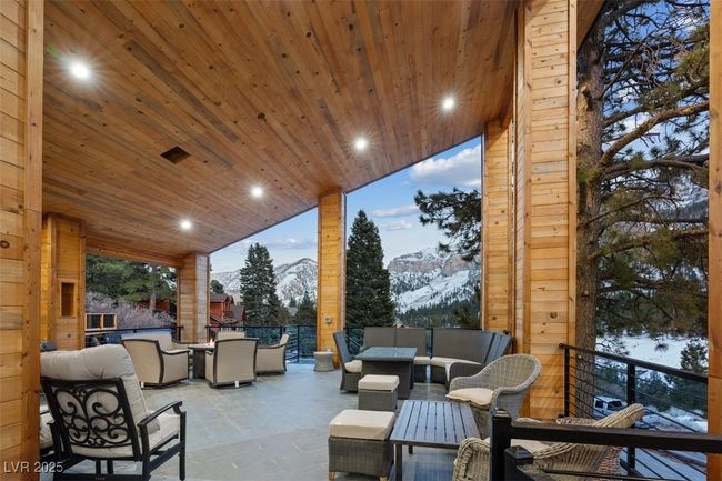 View of patio / terrace with a mountain view and outdoor lounge area | Image 79