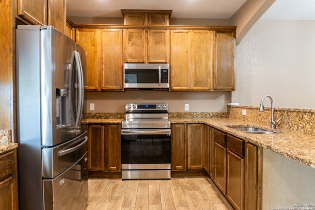 with stainless steel appliances | Image 16