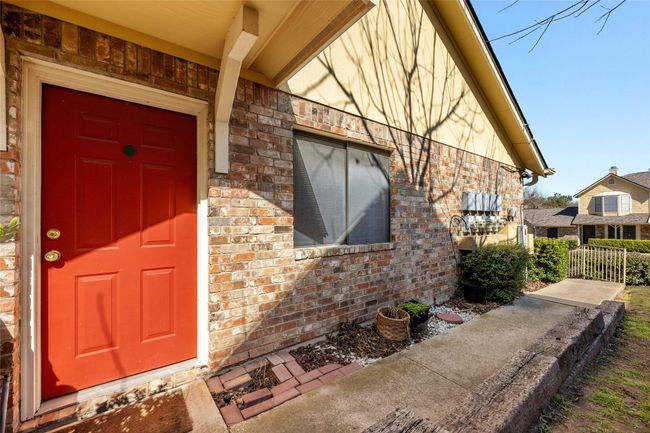 Rare placement of front door gives plenty of space from the parking lot for maximum privacy | Image 19