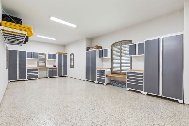 Epoxied Garage Boasts Custom Storage Options for Maximum Organization | Image 29
