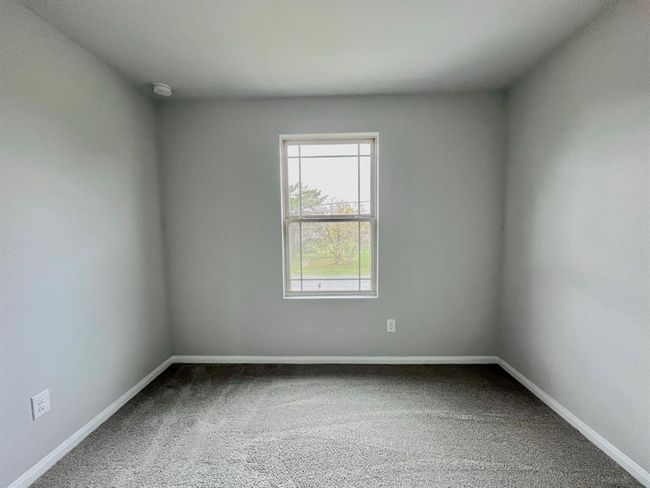 Cozy carpeted bedroom, virutally staged to inspire your dream space. | Image 28