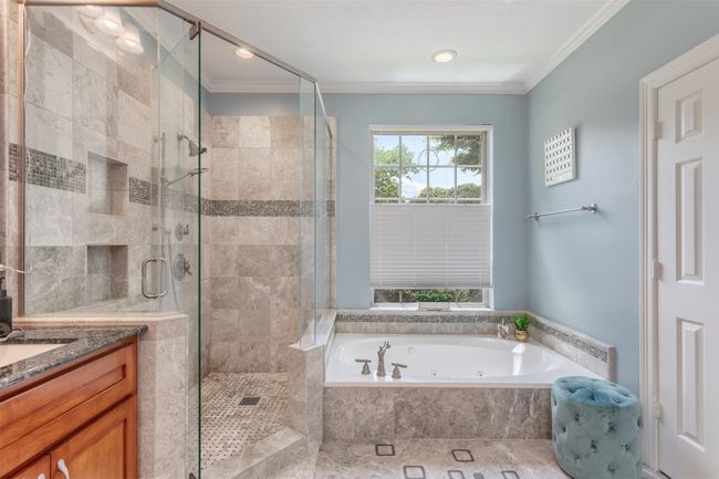 Primary bathroom featuring a whirlpool tub | Image 20