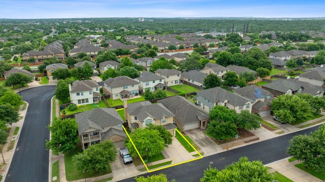 Aerial perspective of suburban area with property boundaries highlighted | Image 6