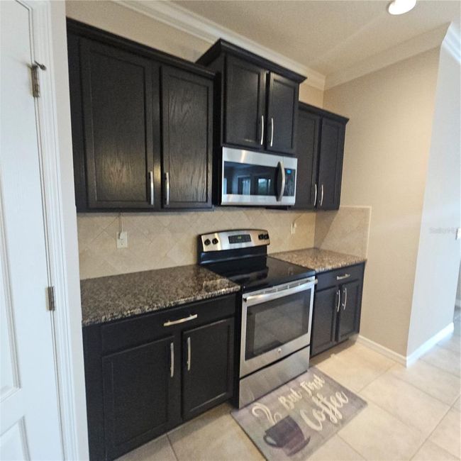 1942 Commander Way, House other with 3 bedrooms, 3 bathrooms and null parking in KISSIMMEE FL | Image 32