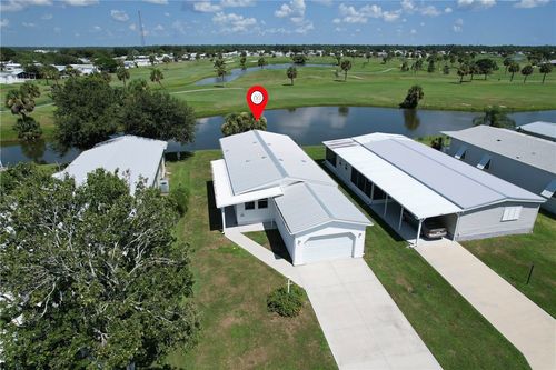 1040 Barefoot Cir, Barefoot Bay, FL, 32976-7037 | Card Image