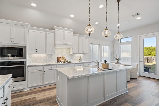 521 Cold River Run, House other with 4 bedrooms, 3 bathrooms and 6 parking in Kyle TX | Image 11