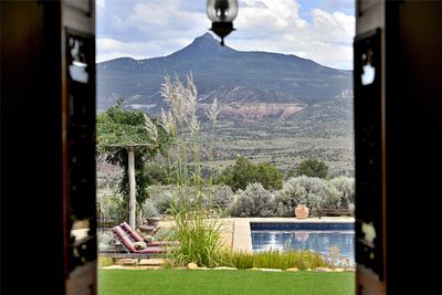 Cerro Pedernal Peaking Out Behind the Pool | Image 2