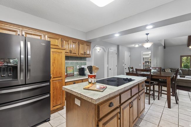 Cook top stove with a down draft, stainless steel new/newer appliances | Image 11