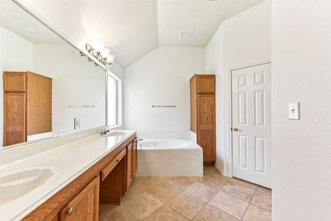 Double vanity with glass shower and soaker jetted tub | Image 30