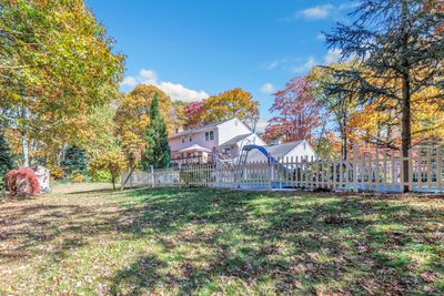 The expansive backyard abuts to open spaces with walking trails. | Image 2