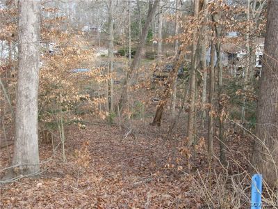 View looking down slope towards valley from Davis Rd | Image 3