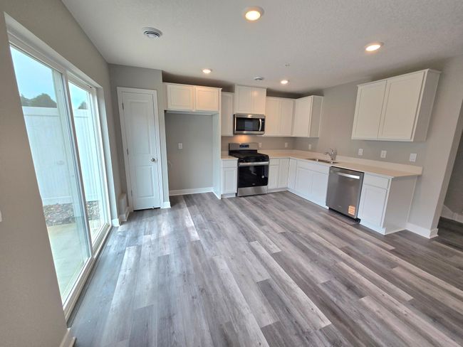 One of the first things you'll notice is our attention to detail throughout the layout, especially here in the kitchen! Photo is of actual home. Colors and options may vary. Ask Sales Agent for details. | Image 17
