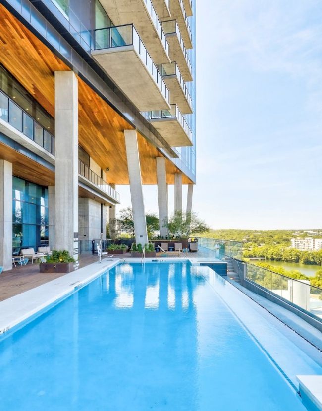 Community pool with a water view | Image 18