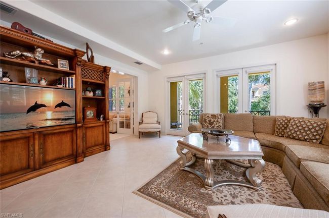 Custom floor plan with bedroom #3/den open to family room. | Image 24
