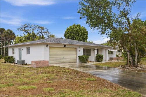 106 E Lake Dr, LEHIGH ACRES, FL, 33936-6908 | Card Image