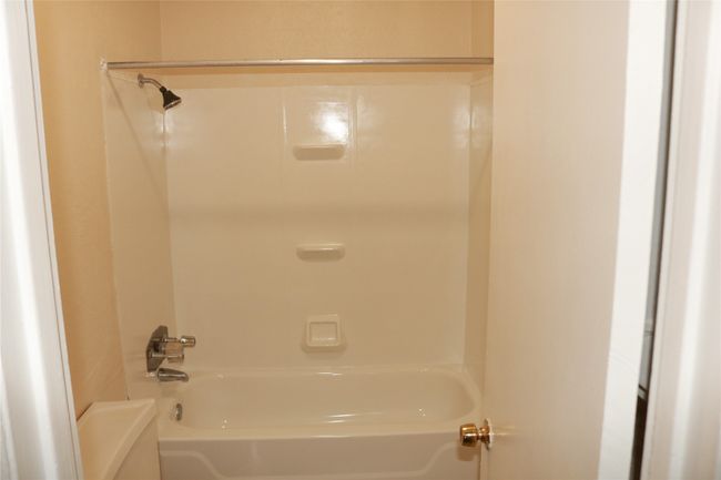 Full bath featuring shower / bath combination | Image 13