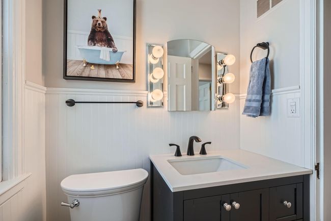 New Vanity with Moen faucet and matching fixtures, New dual flush American Standard toilet | Image 12