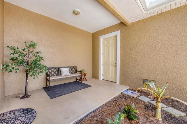 Covered corridor from laundry to garage | Image 19