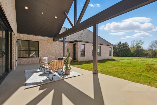 View of patio with a lanai | Image 34
