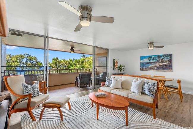 A pretty bay view and lush greenery are calming features of this lovely unit. | Image 10