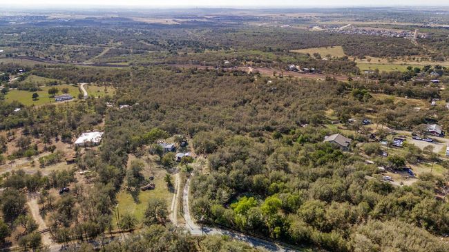 View of property location featuring a heavily wooded area | Image 6