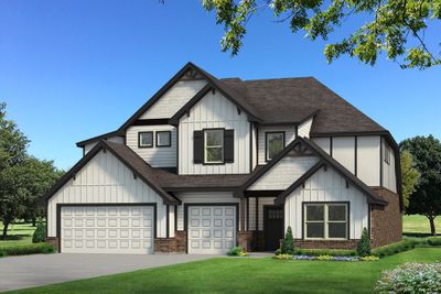 View of front facade with a garage and a front yard | Image 3