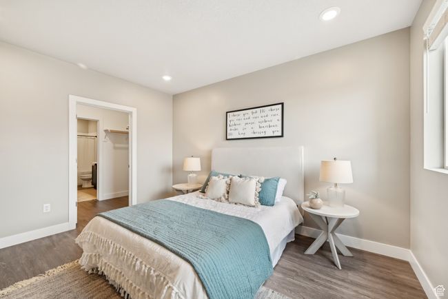 Bedroom with recessed lighting, wood finished floors, and baseboards | Image 12