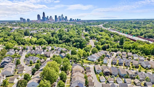 Located in the heart of the Queen City within minutes of Uptown, Camp North End, Optimist Hall, AvidXchange Music Factory, I-77, CLT airport & more! Move-in ready two story home features over 2, 300 square feet, 3 bedrooms, 2 full & 1 half bathrooms in the desirable Brightwalk neighborhood. | Image 34