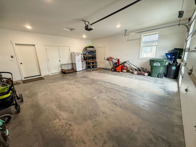 2 car Garage featuring garage door and heat | Image 37