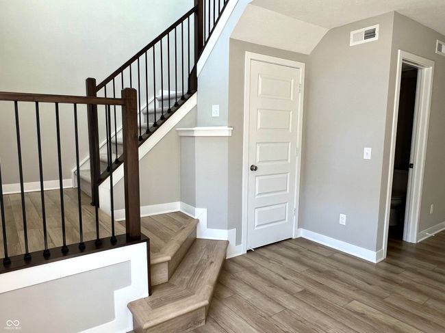 Lower level with access to 1/2 bath and garage | Image 8