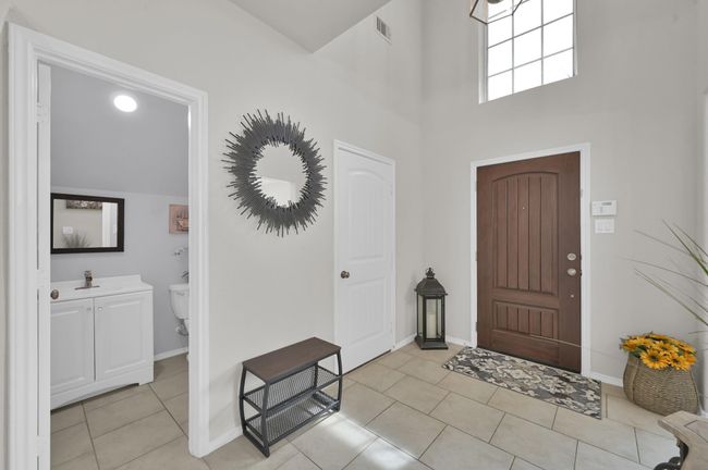 Another view of the foyer showcases the two-story ceiling entry. | Image 28
