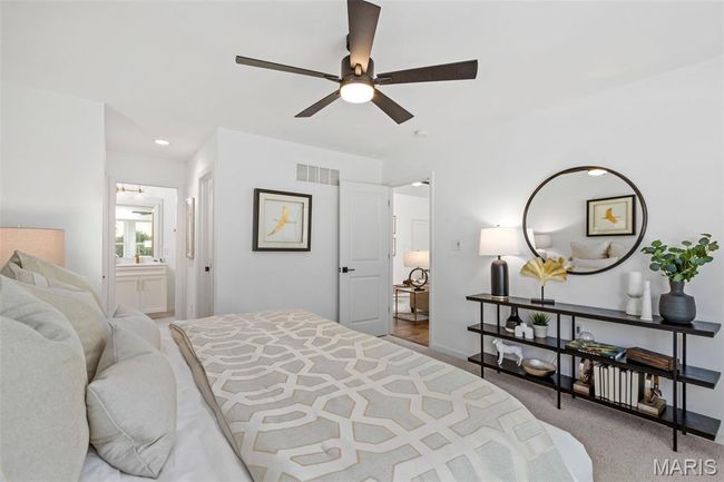 Bedroom featuring carpet, baseboards, recessed lighting, ensuite bathroom, and a ceiling fan | Image 20