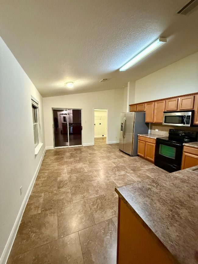 1018 Gentry Dr, House other with 3 bedrooms, 2 bathrooms and 4 parking in Leander TX | Image 4